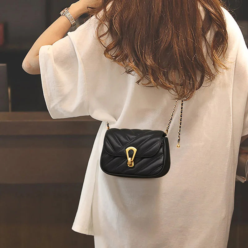 Bolsa crossbody elegante.